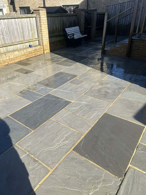 Slate patio after pressure washing, clean blue grey stone, Isle of Wight
